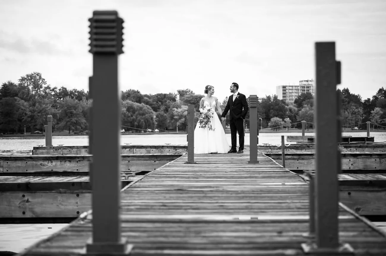 Black and white portrait of a couple on the docks